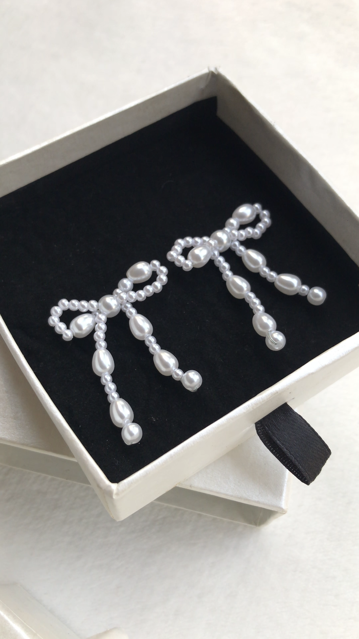 pearl bow earrings